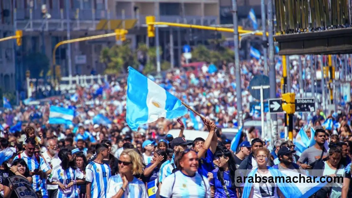 Argentina football team supporter cheering with national flag